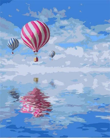 Ballons Flying Over Sea