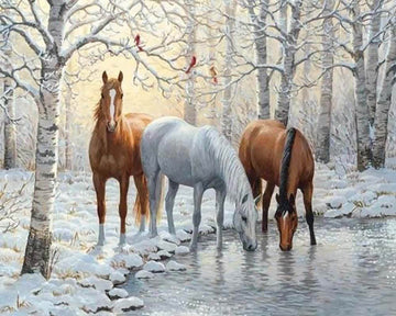 Three Horses in the Snowy Forest