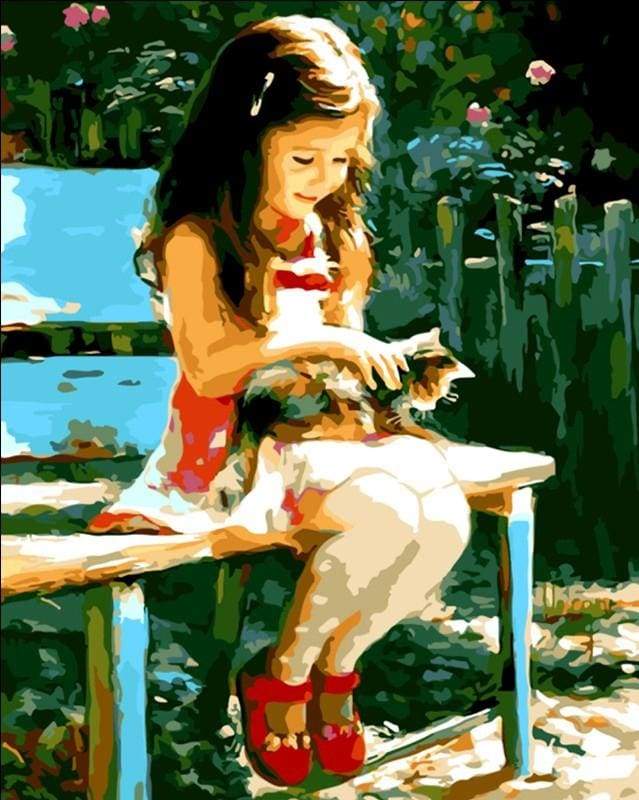 Little Girl in the park with her cat