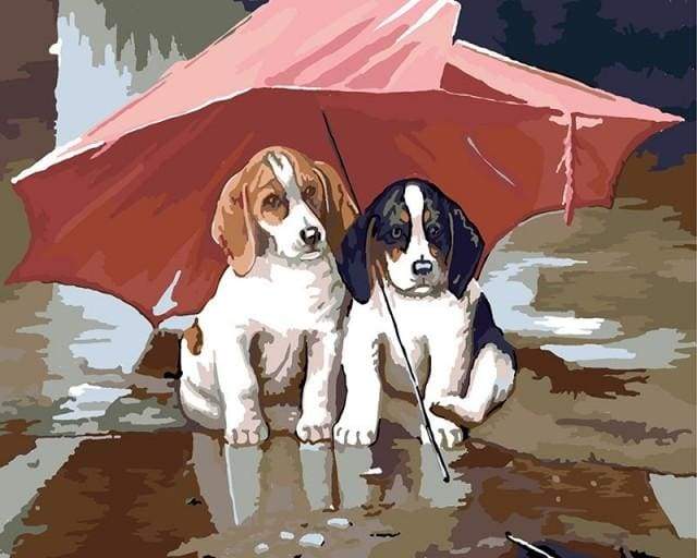 Two Puppies under a red umbrella