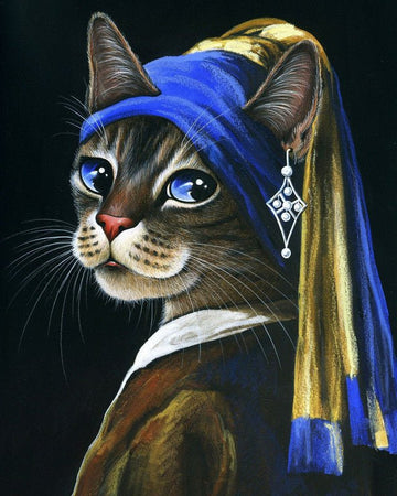 Young kitten with a pearl