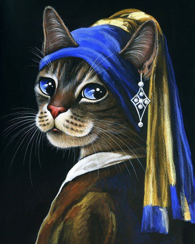 Young kitten with a pearl